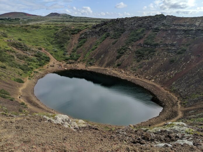 A large crater in the middle of a mountain