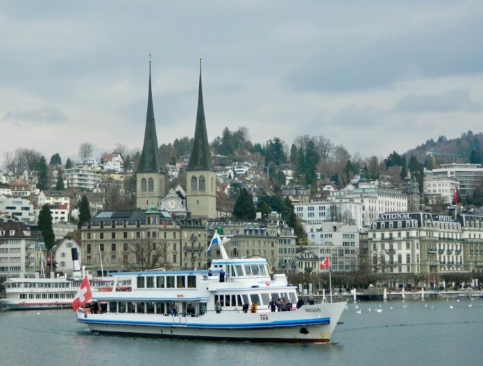 a large white and blue boat in a body of water